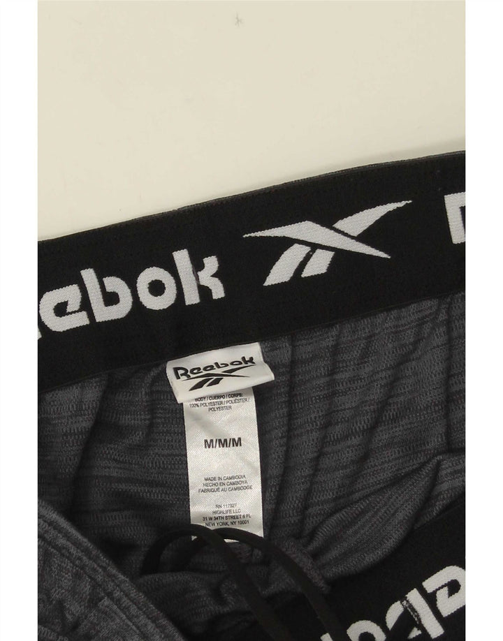 Pantaloncini sportivi Reebok da uomo in poliestere grigio medio