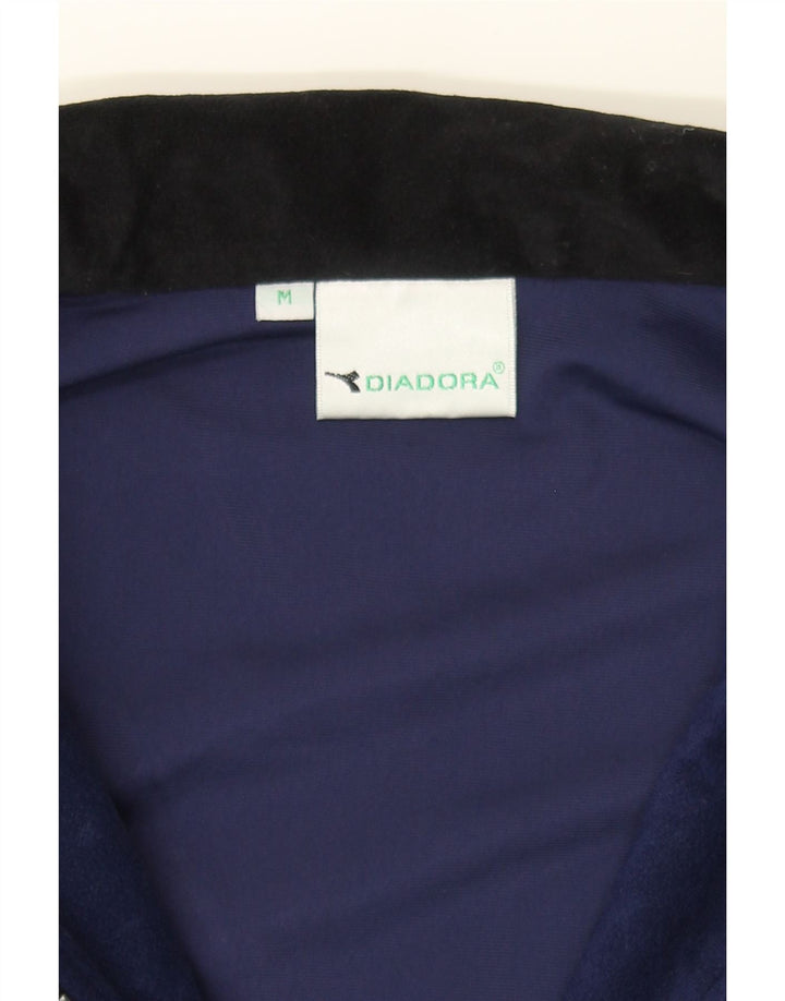 DIADORA Womens Oversized Tracksuit Top Jacket UK 14 Medium Navy Blue Vintage Diadora and Second-Hand Diadora from Messina Hembry 
