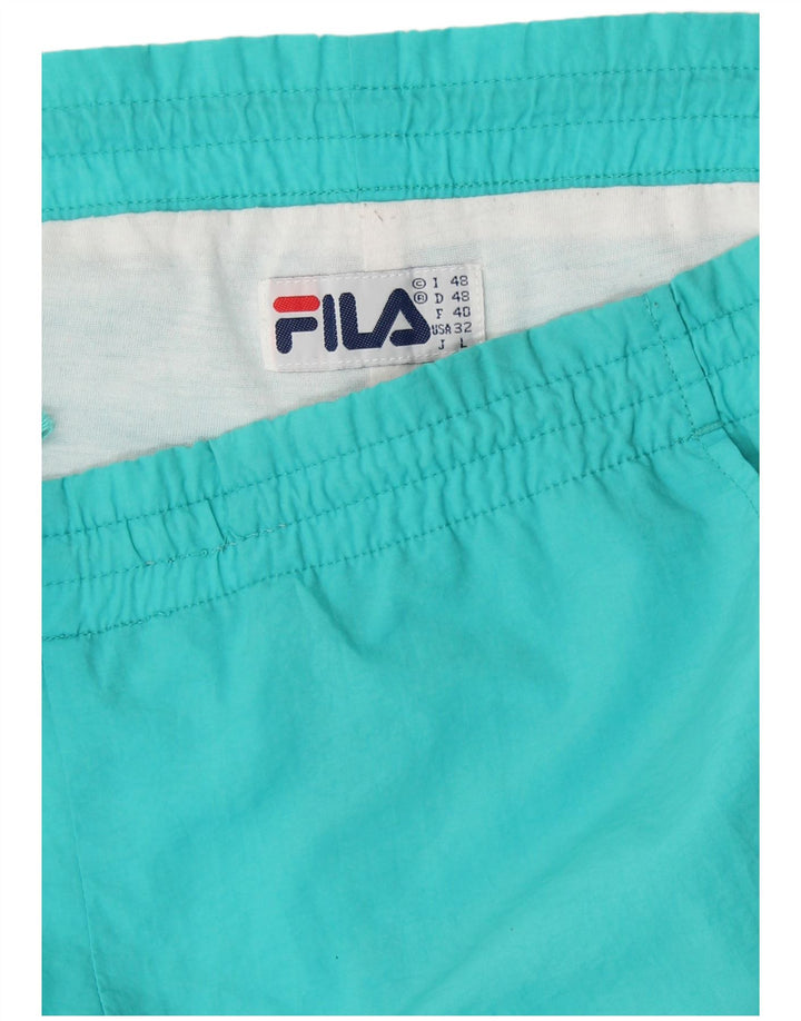 Pantaloni da tuta da uomo FILA Joggers IT 48 Medium Turchese Nylon