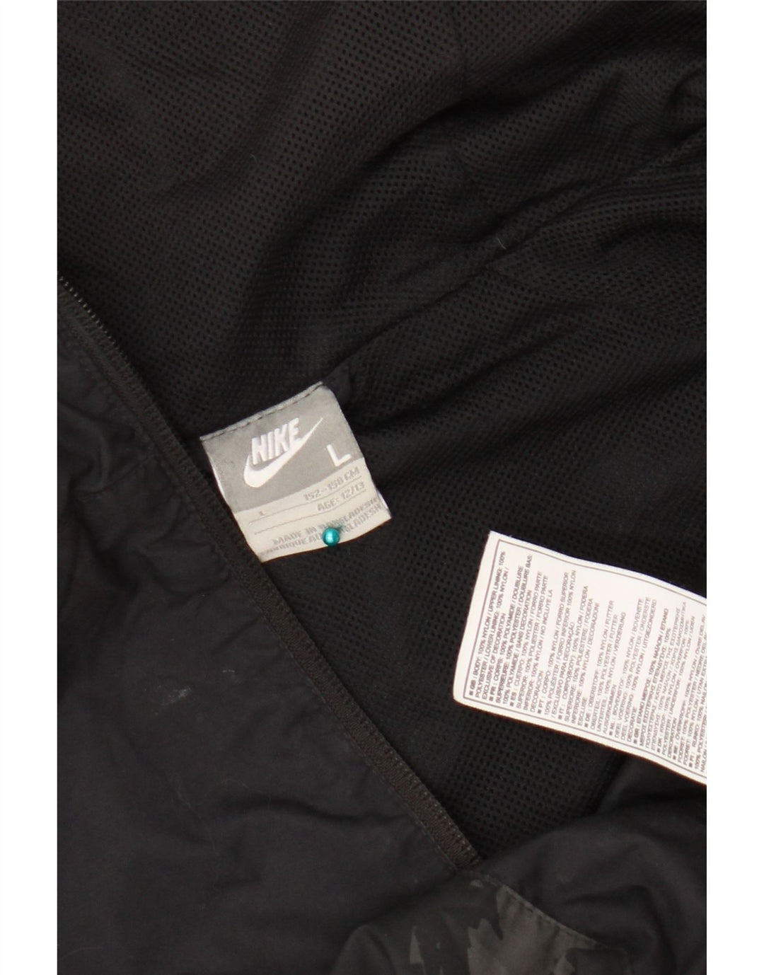 Giacca antipioggia con cappuccio grafico Nike da ragazzo 12-13 anni Large Nera geometrica