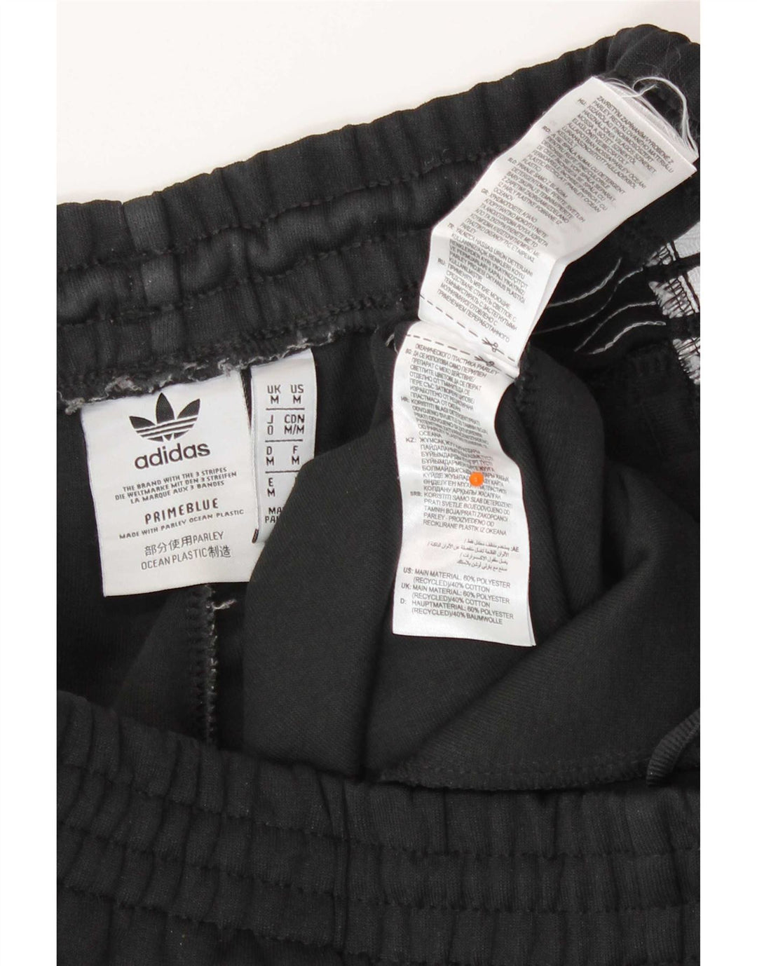 Pantaloni da tuta da uomo Adidas Prime blu da jogging medio poliestere nero