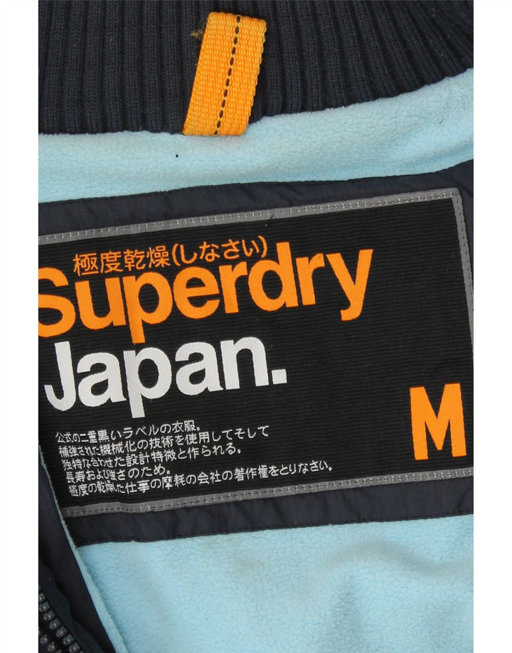 Giacca a vento con cappuccio da donna Superdry UK 14 nylon blu navy medio