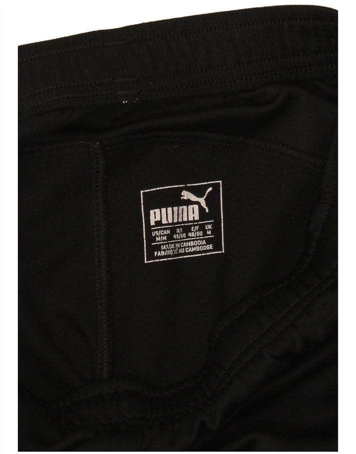 Pantaloni Puma Windbreaker da donna UK 12 Medium Neri