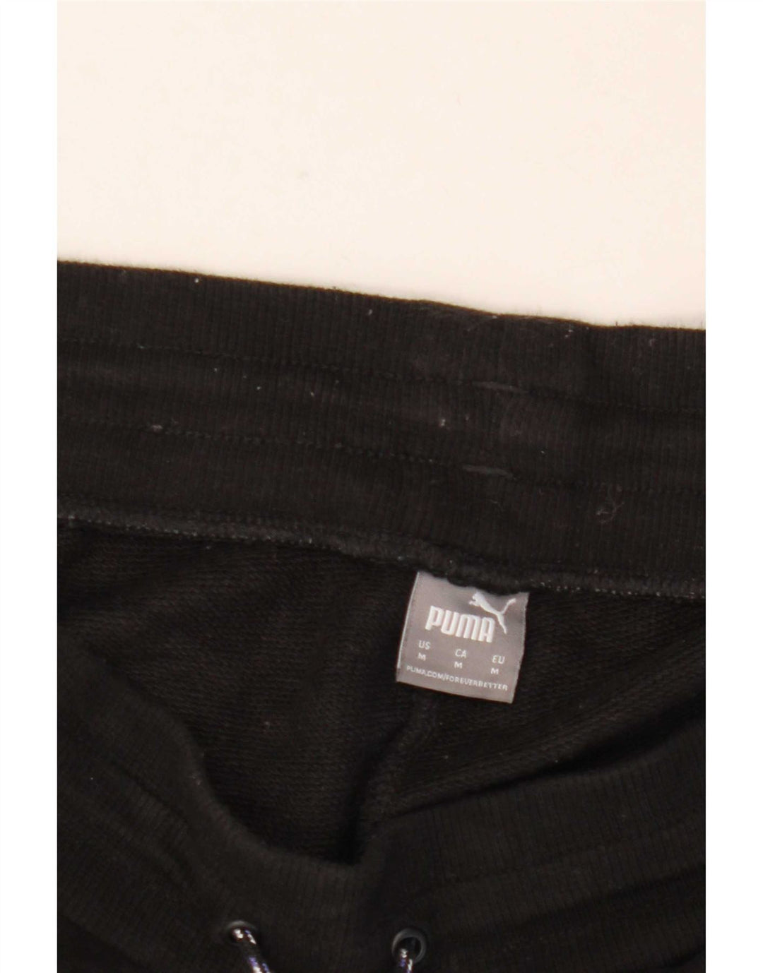 Pantaloni da tuta da uomo Puma Joggers medi neri con stampa animalier