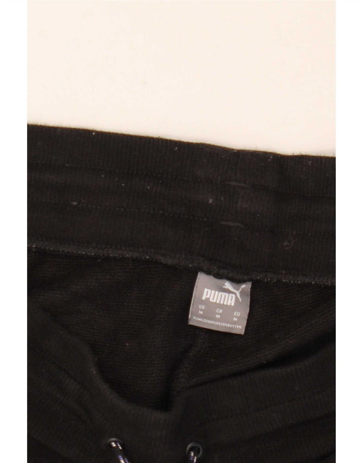 Pantaloni da tuta da uomo Puma Joggers medi neri con stampa animalier
