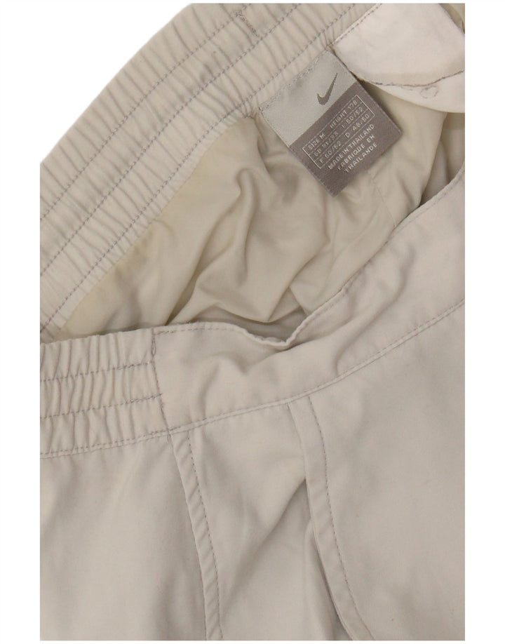 Pantaloni antivento da uomo NIKE medi W32 L31 color block bianco