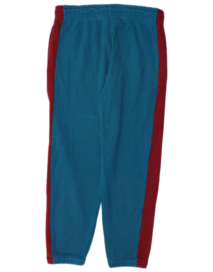 Pantaloni da tuta da uomo Nike Joggers in cotone color block blu medio