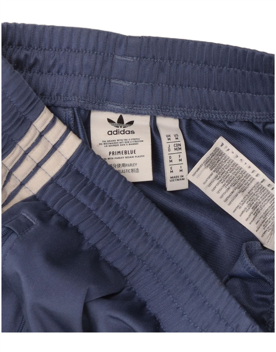 Pantaloni da tuta da uomo Adidas medi in poliestere blu navy