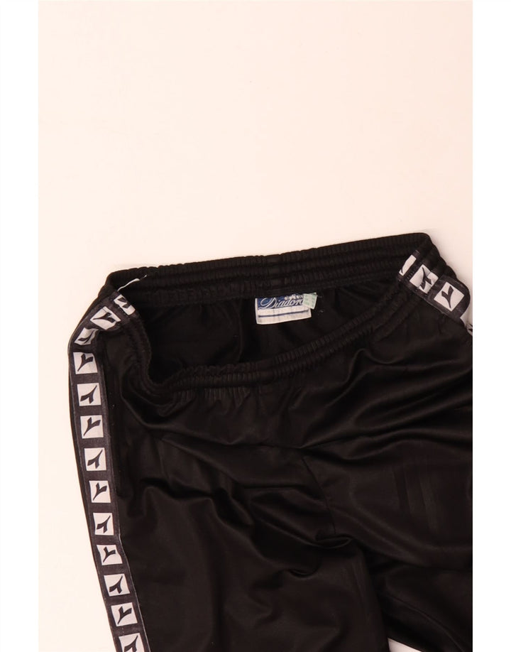 Tuta intera DIADORA da donna con grafica oversize UK 10 piccola nera