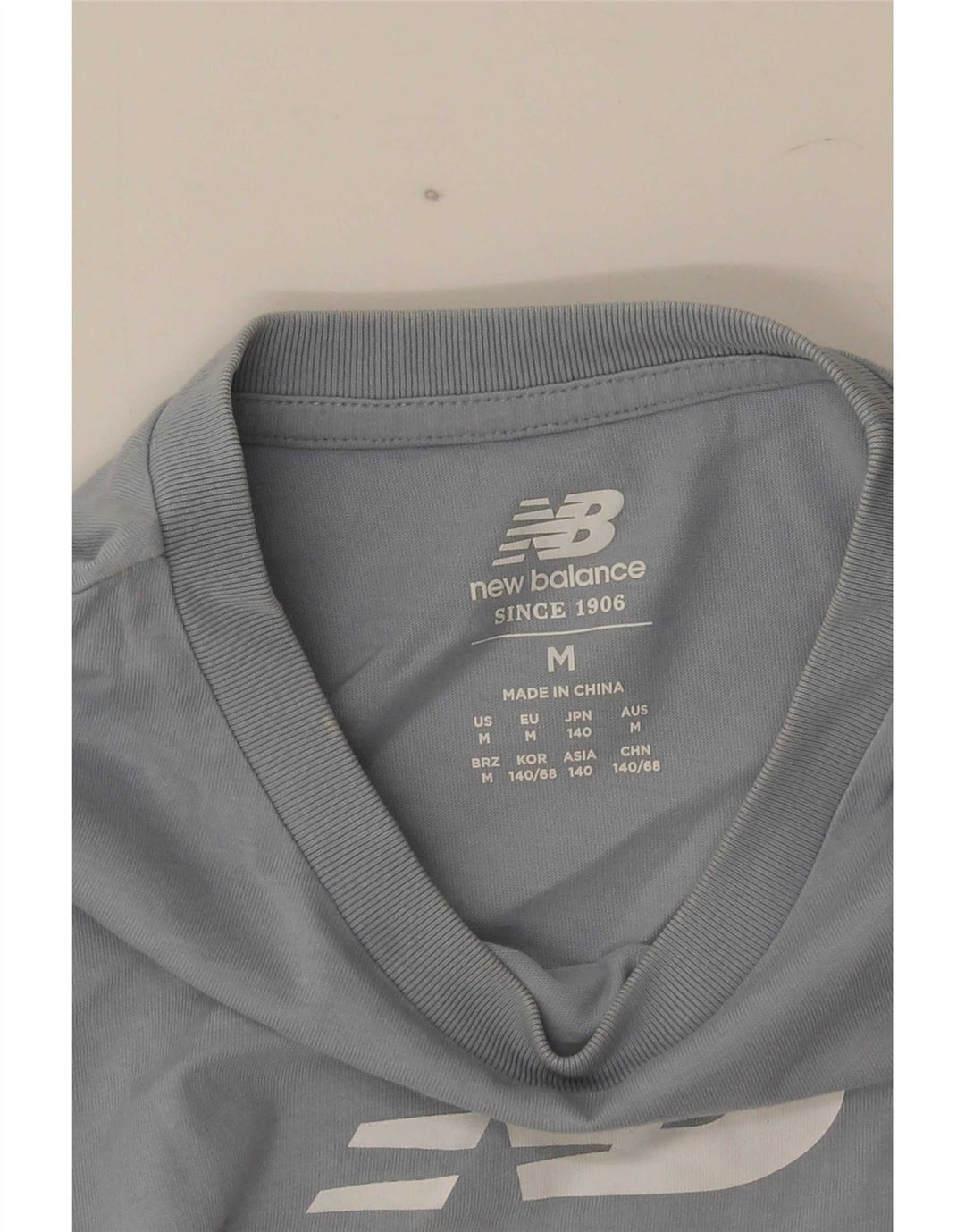 Maglietta grafica per ragazzi New Balance Top 9-10 anni Blu medio