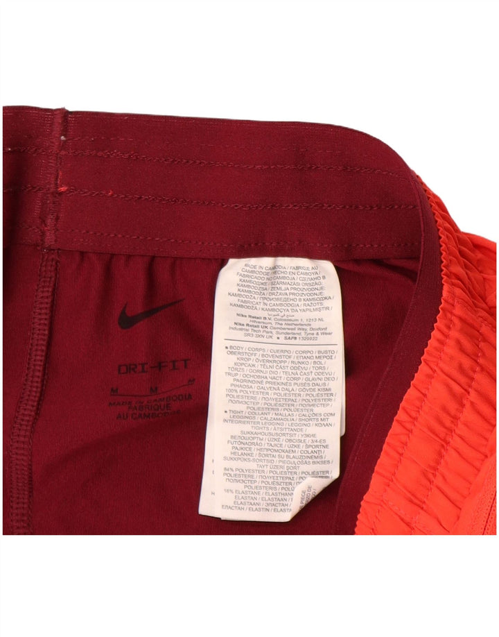 Pantaloncini sportivi Nike da donna Dri Fit UK 12 poliestere color block arancione medio