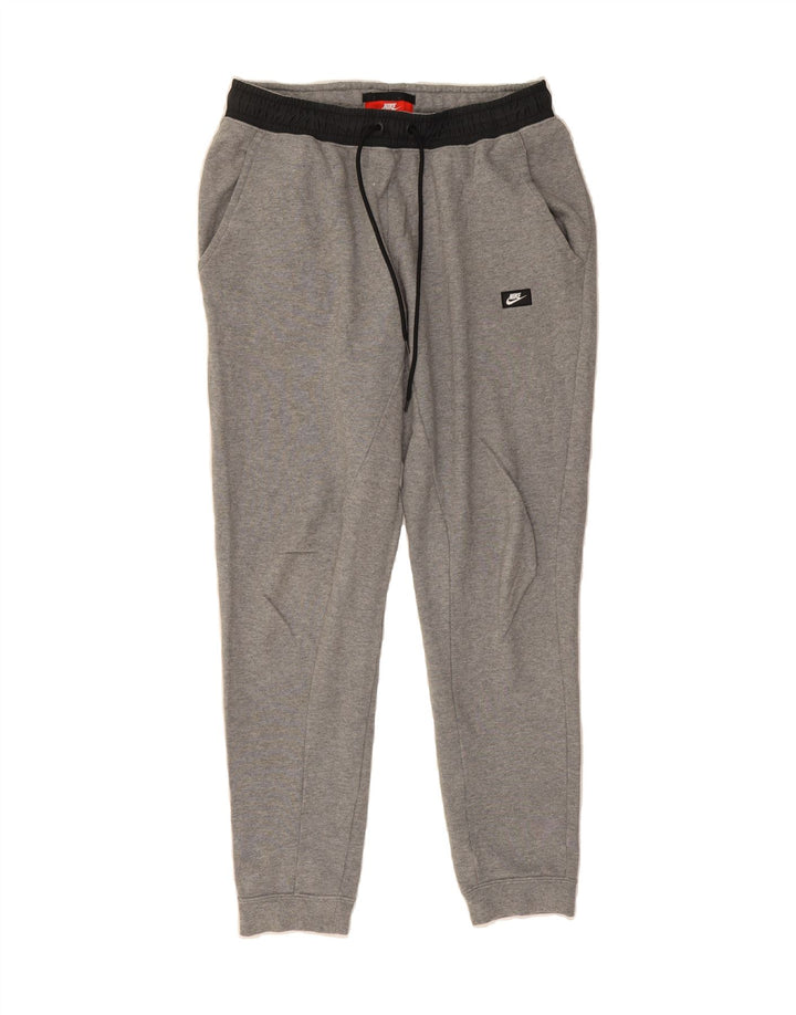 NIKE Mens Tracksuit Trousers Joggers Medium Grey Cotton Vintage Nike and Second-Hand Nike from Messina Hembry 