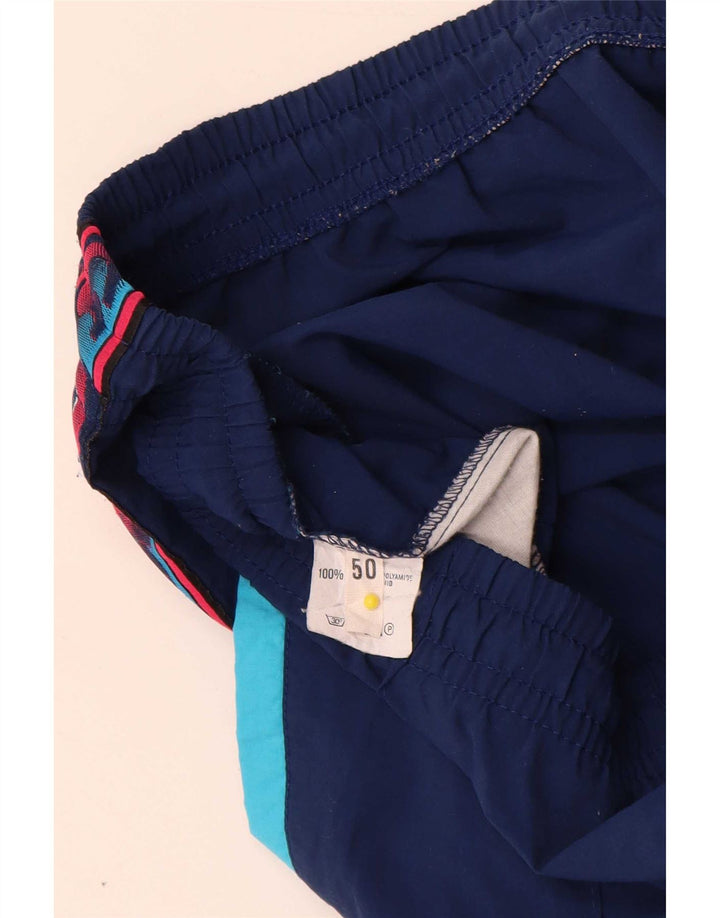 Pantaloni da tuta grafica da uomo Asics IT 50 Medium Blu Navy Colourblock