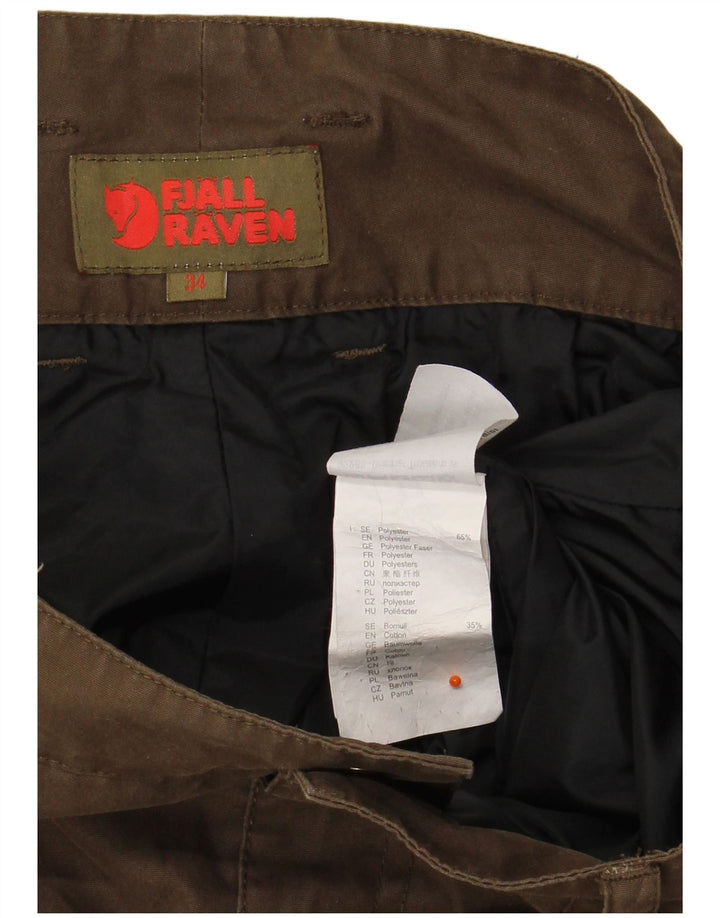 Pantaloni antivento mimetici da donna FJALL RAVEN W34 L30 poliestere kaki