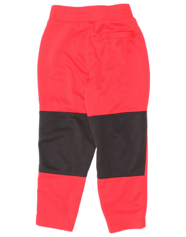 Pantaloni da tuta grafica Nike da ragazzo 3-4 anni Rosso Colourblock