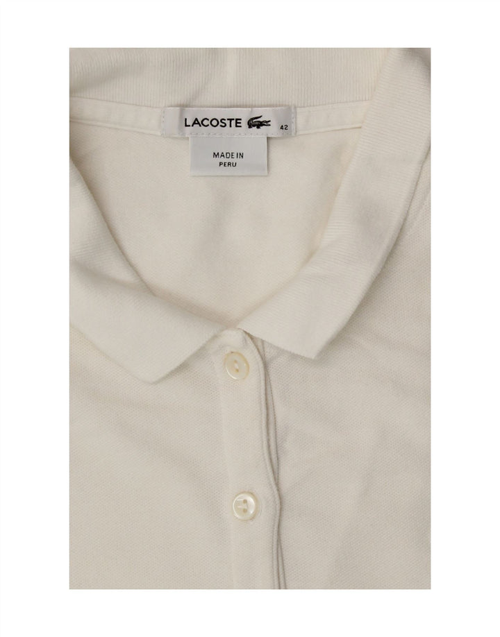 Polo senza maniche da donna Lacoste taglia 42 grande bianca