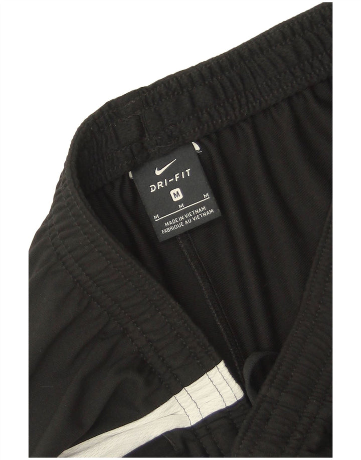 Pantaloni da tuta Nike Dri Fit da uomo color block medio nero