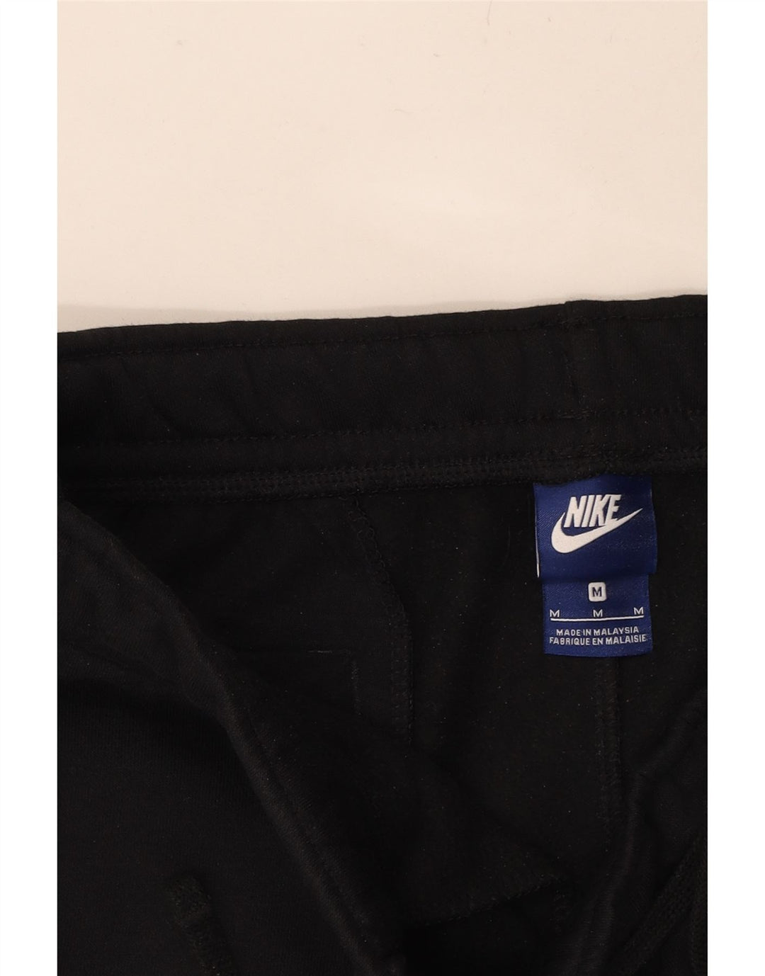 NIKE Mens Graphic Tracksuit Trousers Joggers Medium  Black Cotton Vintage Nike and Second-Hand Nike from Messina Hembry 