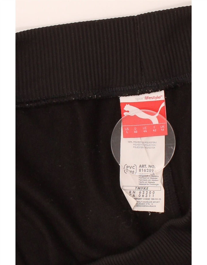 PUMA Womens Tracksuit Trousers UK 14 Large Black Polyester Vintage Puma and Second-Hand Puma from Messina Hembry 