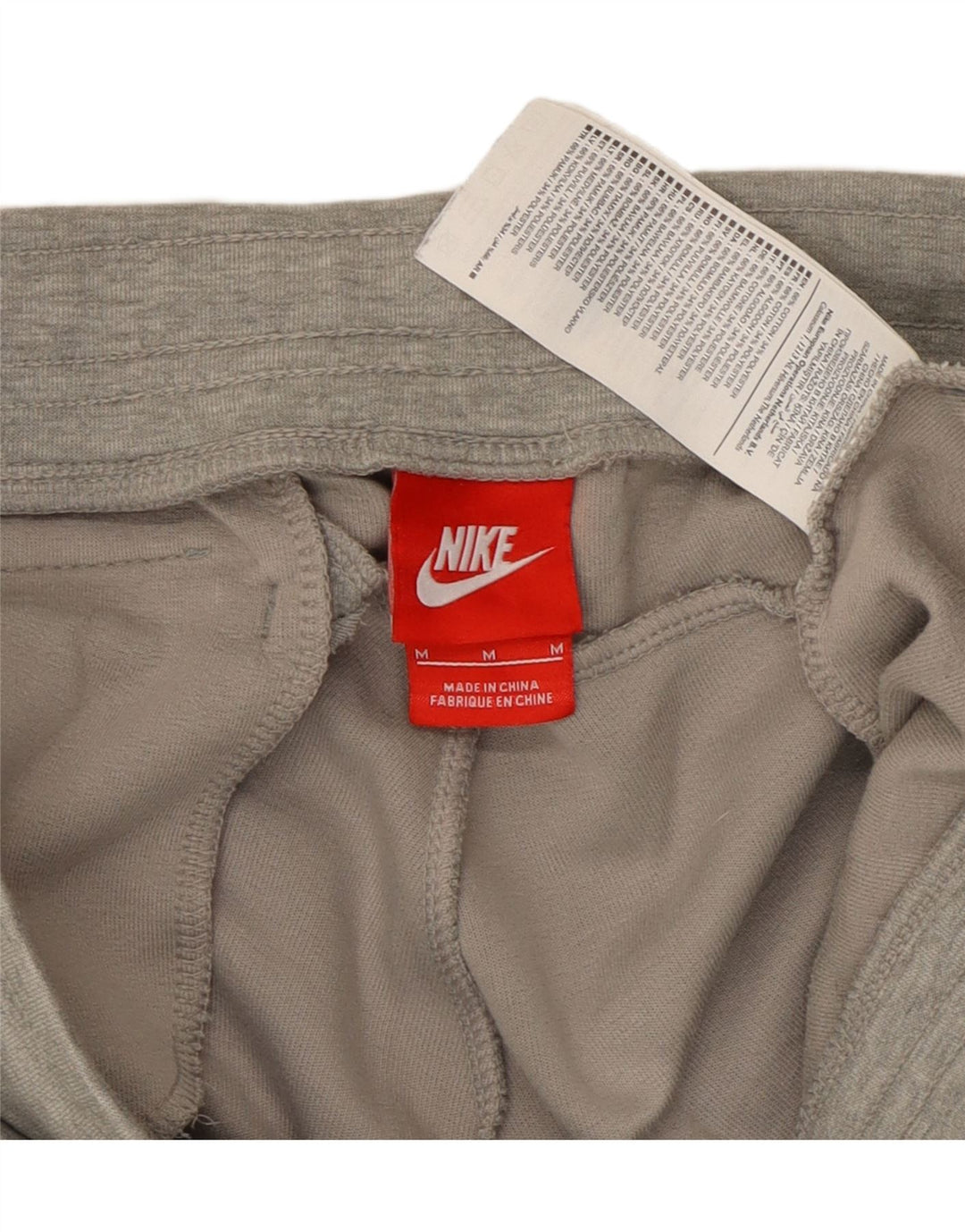 Pantaloni da tuta da uomo Nike Joggers in cotone color block grigio medio