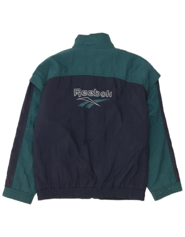 Giacca a vento grafica da uomo Reebok EU 34 XS blu navy in nylon color block