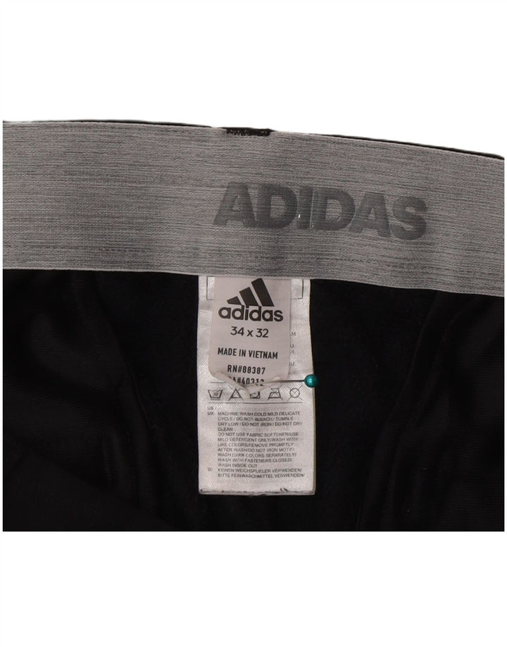 Pantaloni chino slim da uomo Adidas W34 L32 poliestere nero