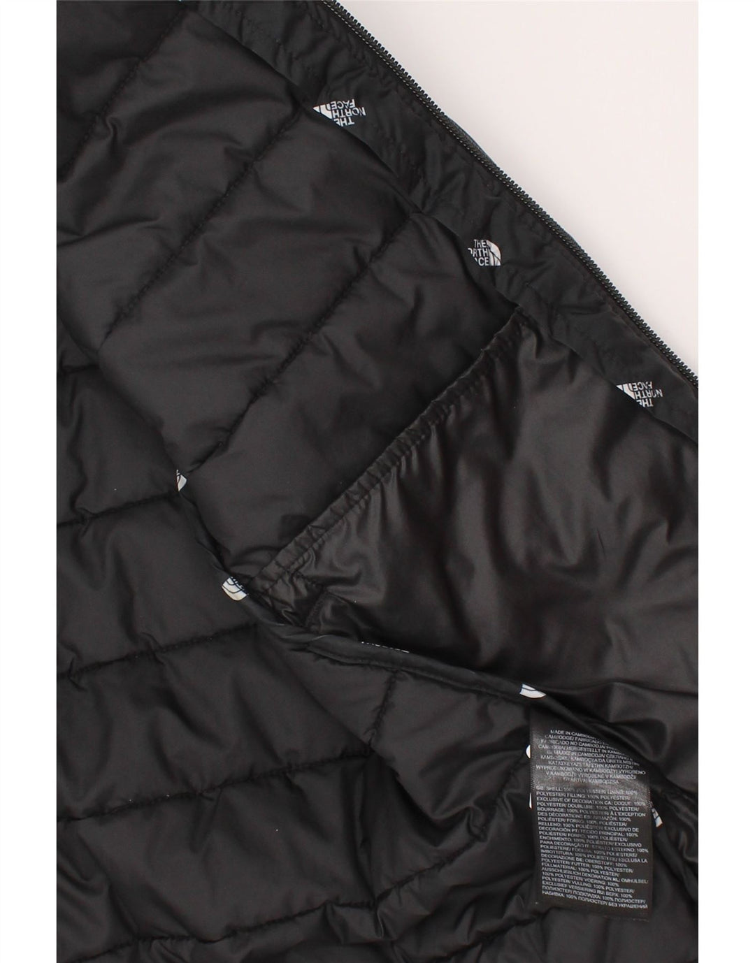 Giacca imbottita con cappuccio grafica The North Face da ragazzo 9-10 anni media nera