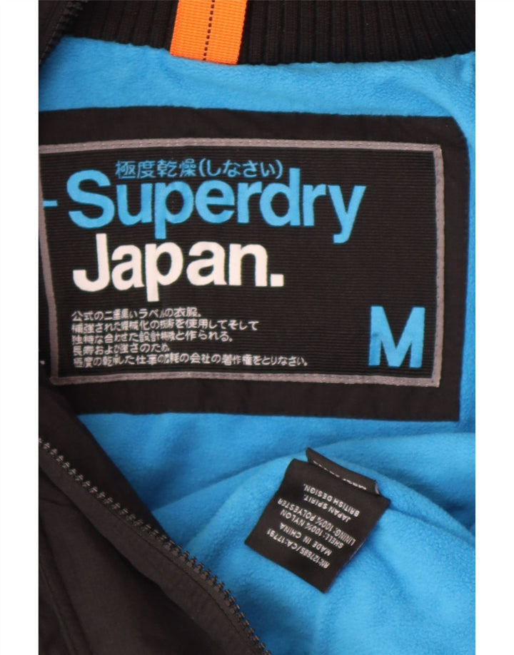 Giacca a vento con cappuccio da donna Superdry UK 14 nylon nero medio