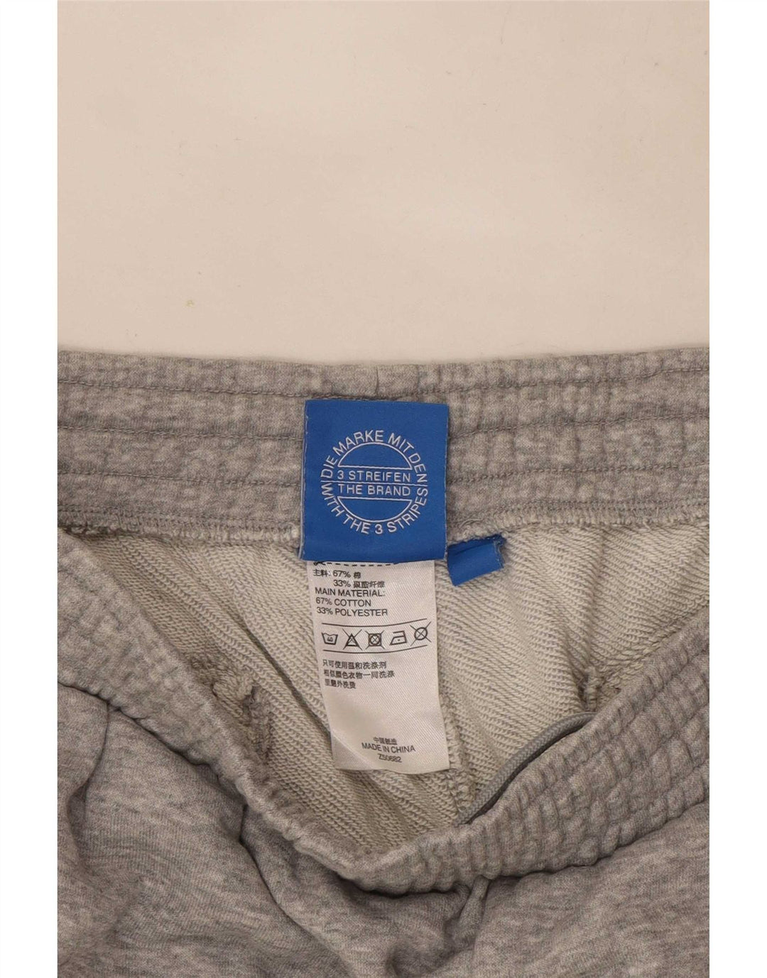 Pantaloni da tuta da uomo Adidas Capri Joggers in cotone chiazzato grigio medio