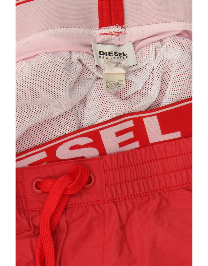 Pantaloncini da bagno con grafica da uomo Diesel in cotone rosso medio
