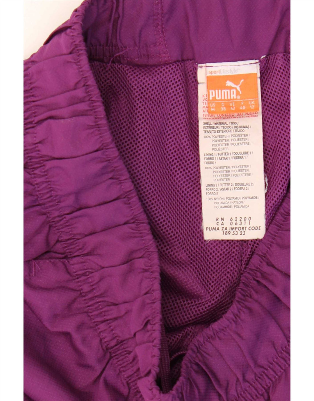 Pantaloni da tuta da donna Puma UK 12 Poliestere color block viola medio