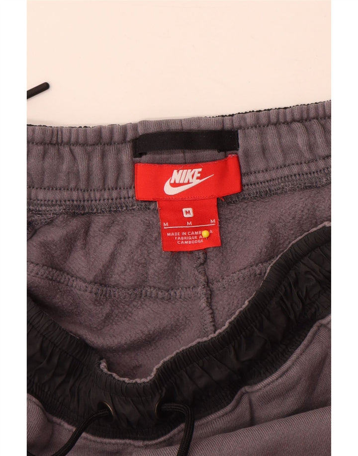 Pantaloni da tuta da uomo Nike Joggers in cotone color block grigio medio