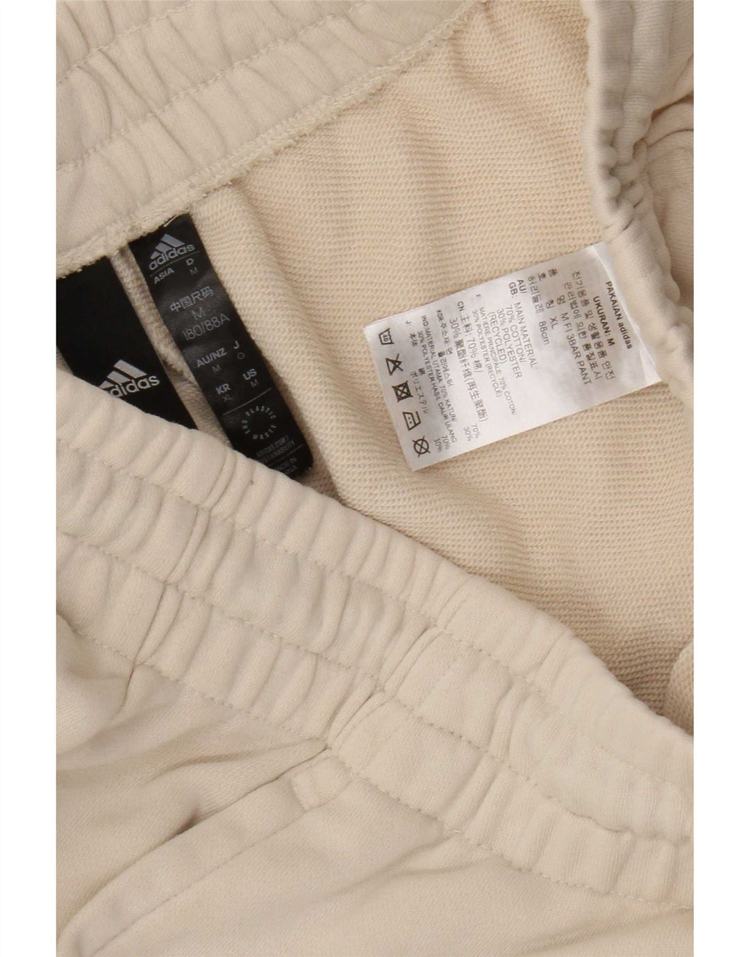 Pantaloni da tuta grafica da uomo Adidas Joggers in cotone beige medio
