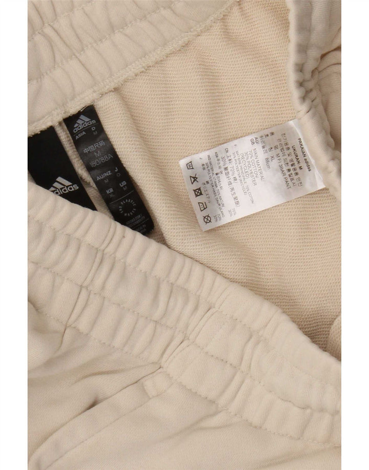 Pantaloni da tuta grafica da uomo Adidas Joggers in cotone beige medio