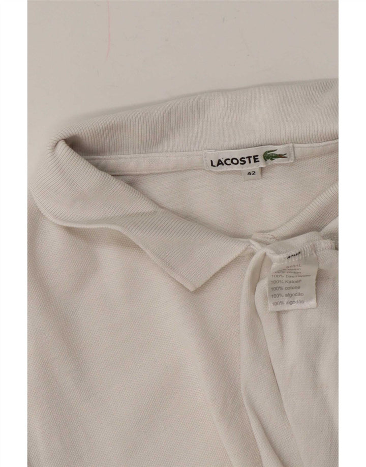Polo da donna Lacoste taglia 42 grande in cotone bianco