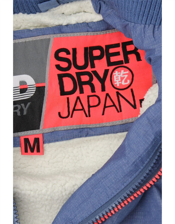 Giacca a vento con cappuccio grafica da donna SUPERDRY UK 14 Blu medio