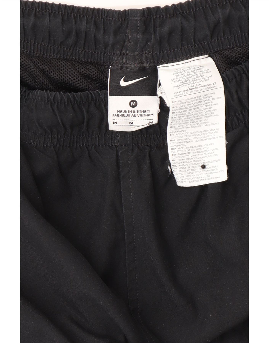 Pantaloni da tuta Nike da uomo in poliestere color block medio nero