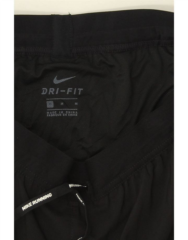 NIKE Womens Graphic Sport Shorts Medium Black Polyester Vintage Nike and Second-Hand Nike from Messina Hembry 