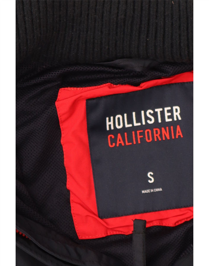 Giacca antipioggia con cappuccio Hollister per ragazzi 13-14 anni taglia piccola in poliestere blu navy