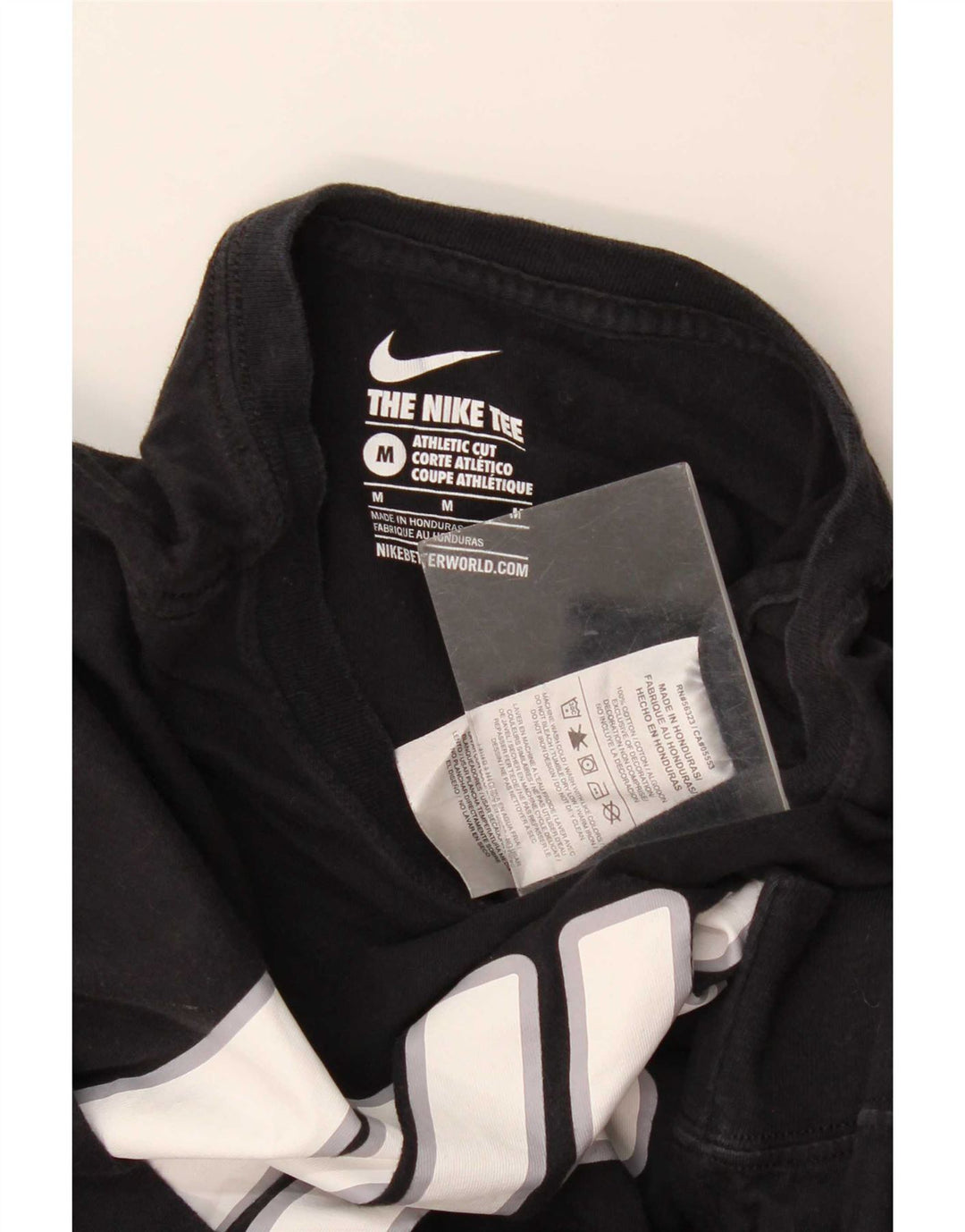 Top Nike da uomo con taglio atletico grafico, manica lunga, colore nero medio