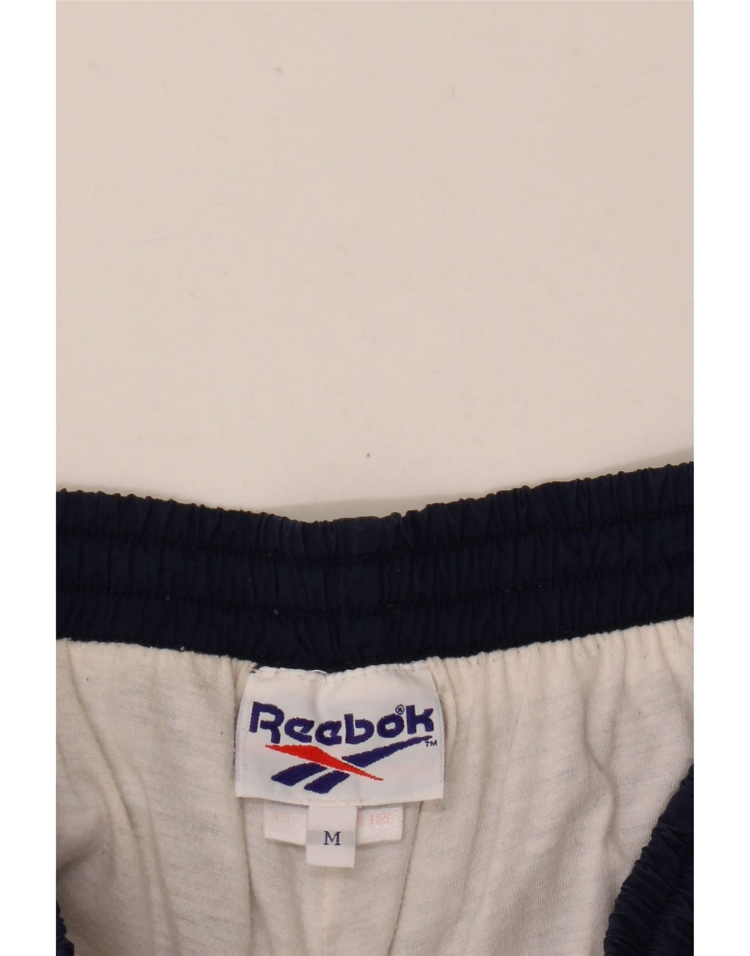 Pantaloni da tuta da uomo Reebok Joggers medi in nylon blu navy