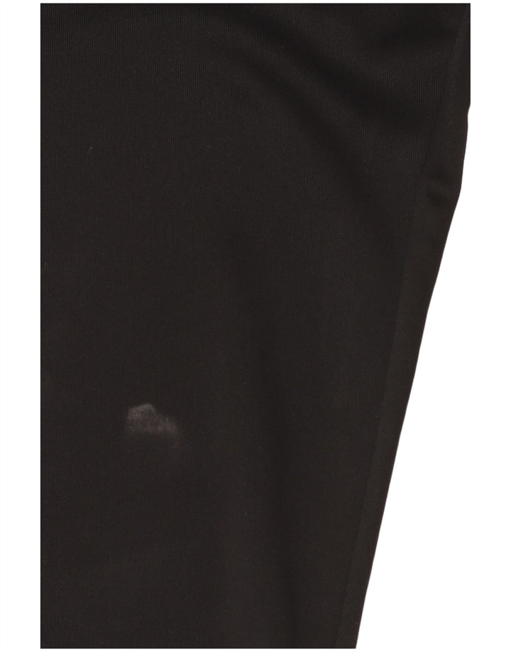 Pantaloni della tuta Nike da uomo di colore nero medio