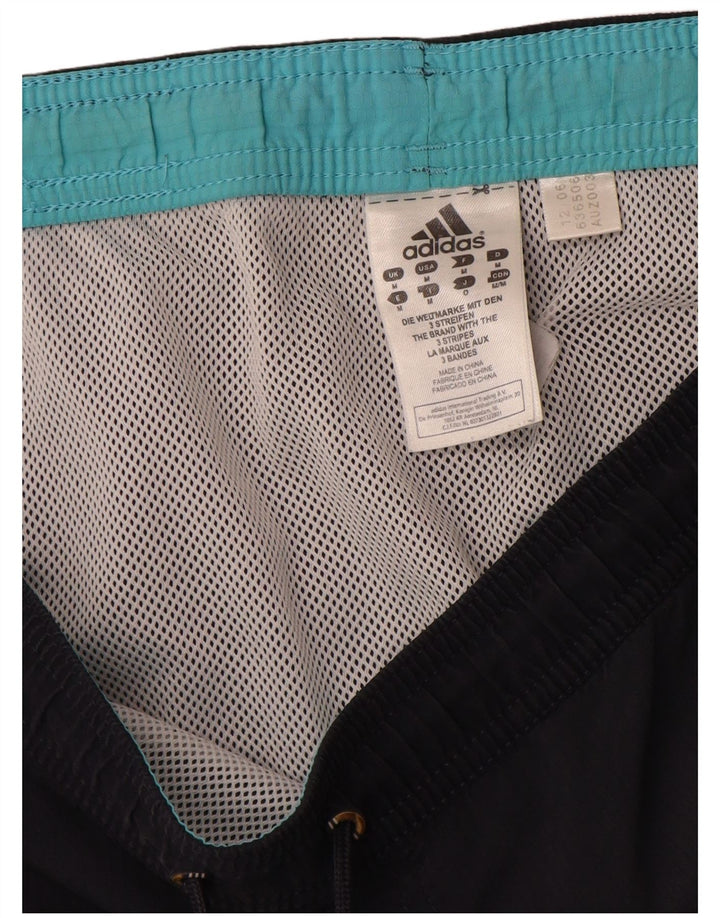 Pantaloncini sportivi Adidas da uomo medi blu navy color block in poliammide