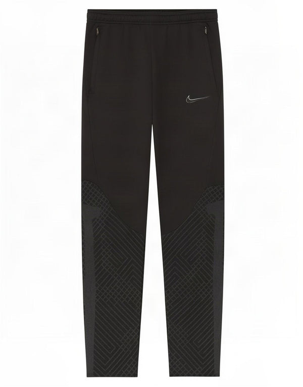 Pantaloni da tuta Nike da ragazzo Dri Fit Slim 13-14 anni XL Nero geometrico