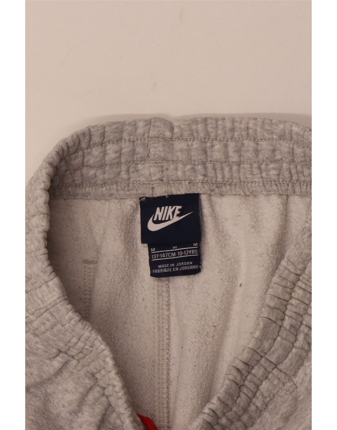 Pantaloni da tuta da ragazzo Nike Joggers 10-11 anni Grigio medio chiazzato