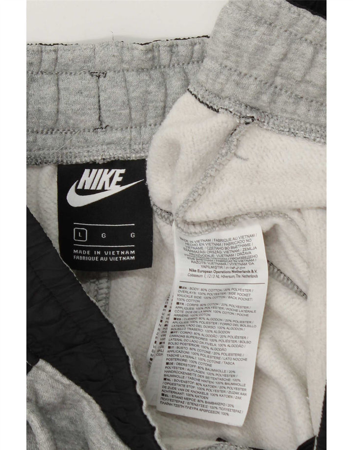 Tuta intera da uomo Nike Large in cotone color block grigio
