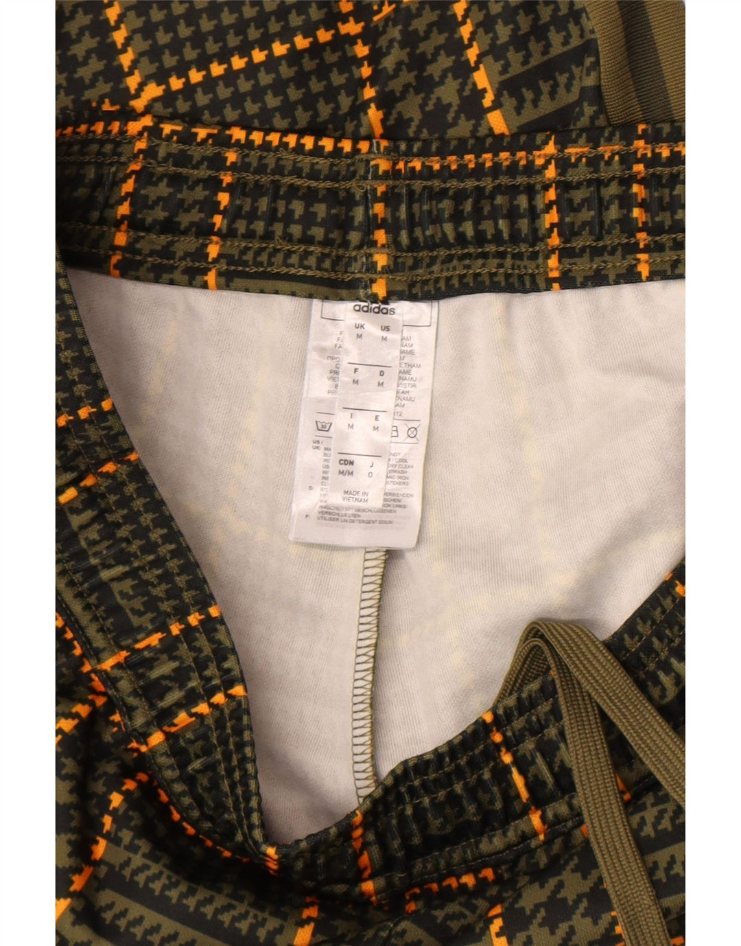 Pantaloni da tuta da uomo Adidas in poliestere pied de poule verde medio