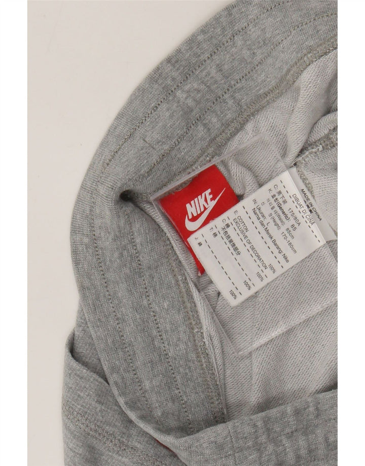 Pantaloni della tuta da ragazzo Nike Joggers 13-14 anni Large in cotone grigio