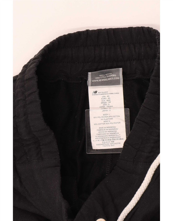 Pantaloni da tuta da donna New Balance UK 4 XS poliestere nero