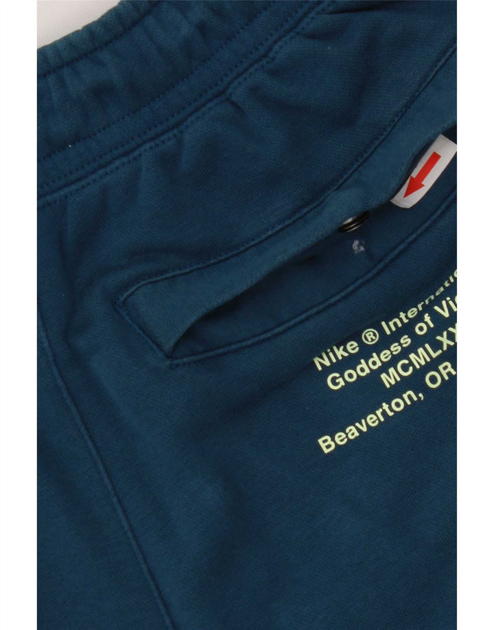 Pantaloncini sportivi Nike da uomo con grafica piccola in cotone blu